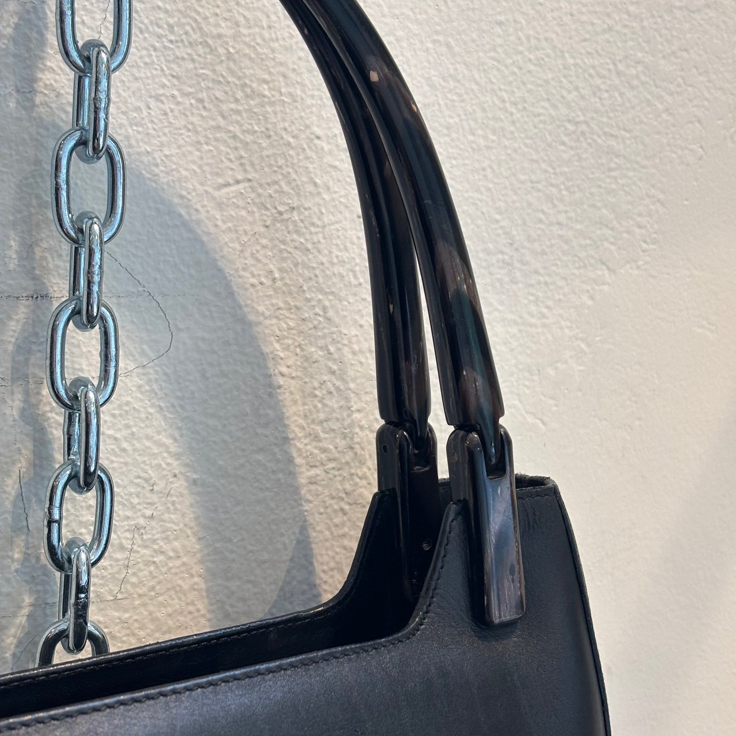 Prada black leather PU straps bag